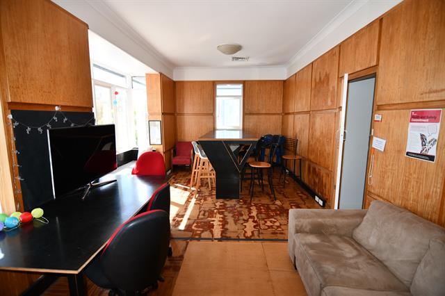 Boardroom original timber wall panelling and parquetry floor damaged by sanding