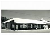 Angled front elevation of building East of post office