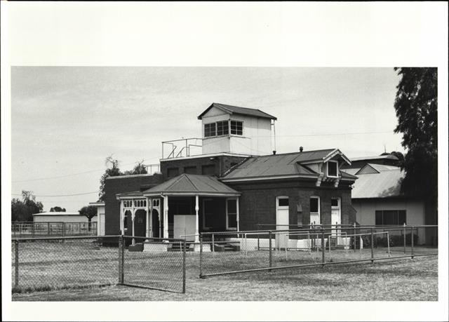 Angled front elevation of judges building