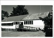 Side view of school building showing contrast between old & new portions