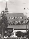 Exterior elevation from Victoria Street - town war memorial at base