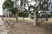 Corner of Trafalgar and Wittenoom Streets (north-est corner of cemetery)