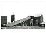 Front view of the entire conveyor building and full length of the belt