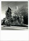 Right corner elevation of church (partially obscured by trees)