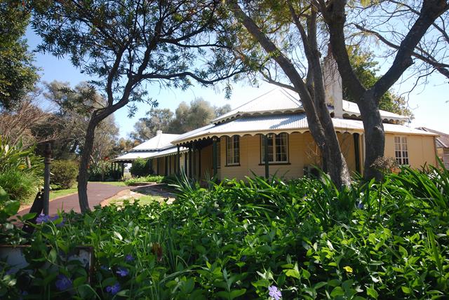 Front elevation of Homestead with garden in foreground