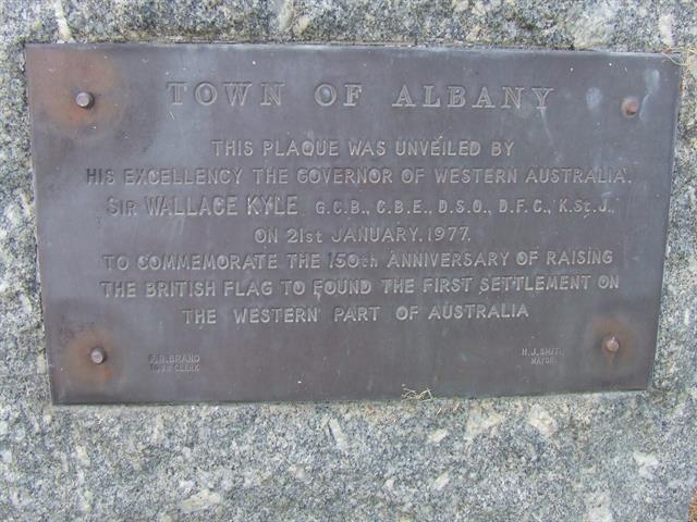 Plaque on granite rock at Parade Street end