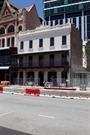 Globe Hotel, view from Wellington Street. Construction work going on around buil