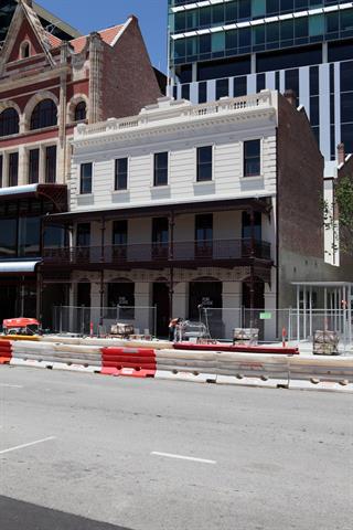 Globe Hotel, view from Wellington Street. Construction work going on around buil