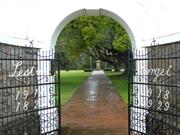 View through entrance gate from west