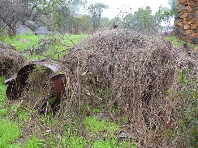Building 1, exterior, building debris - view south