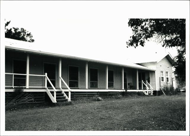 Angled view of portion of nurses quarters frontage