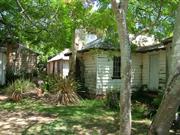 Outbuilding - central cottage (RHS) and kitchen (centre) from east