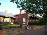 Hamton Street (west) facade. Former Police Station & Lockup (LHS) and Quarters (