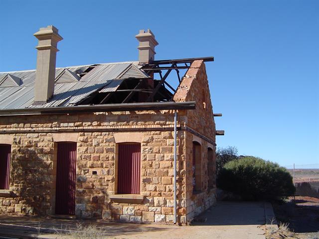 Corner Elevation showing areas of missing roof