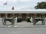 Garrison Barracks front south elevation and field guns