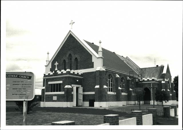 Front corner elevation showing east end and north side