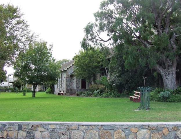 The Church to the right front and the Rectory at the rear