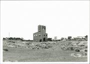 Distant view of old mine silo