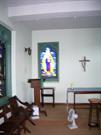 Interior of east wall of the Memorial Chapel showing stained glass window of the