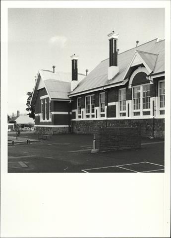 View of portion of rear façade from bitumen lunchyard