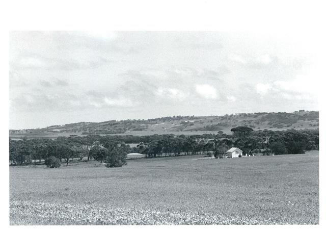 Distance view of the church and surrounding setting