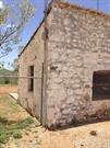 South West corner, cracks extend full height