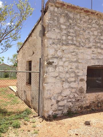 South West corner, cracks extend full height