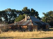 South and front elevation showing shingle roof over porch