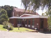 Corner view of Parish Hall and Church