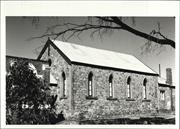 Angled right side elevation of old church