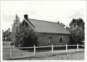 Angled right side elevation of church