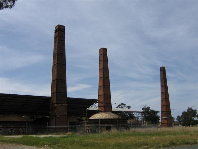 Looking east - beehive kilns 5,6,7,8,9,10,11,12 and 3 stacks