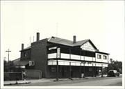 Angled front elevation of building