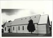 Angled front elevation of church from North