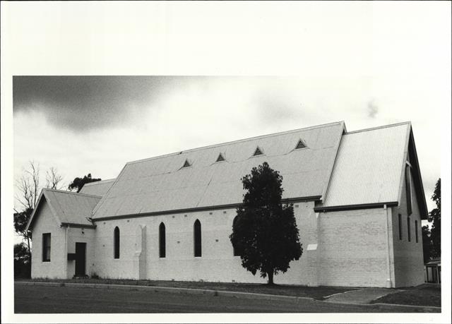 Angled front elevation of church from North