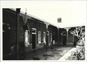 View of central courtyard of National Hotel showing bedroom doorways