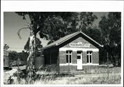 Angled front elevation of building