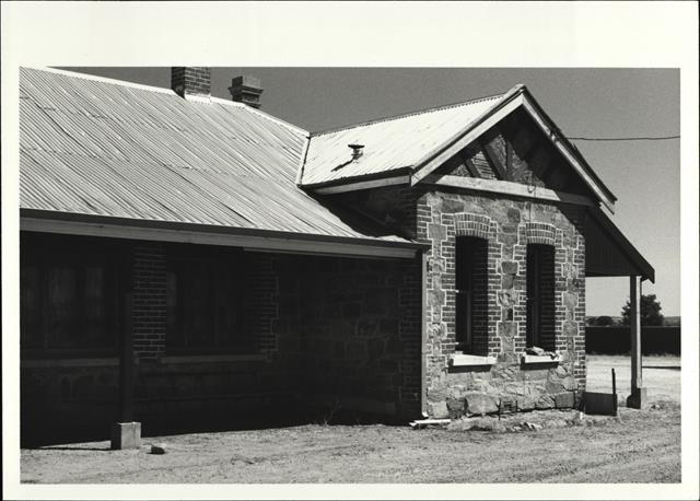 Angled view of portion of East side of hotel