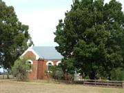 View to side elevation from North