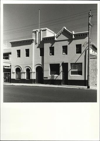 Angled front elevation of building