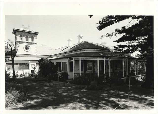 Front corner elevation showing the rear of the house
