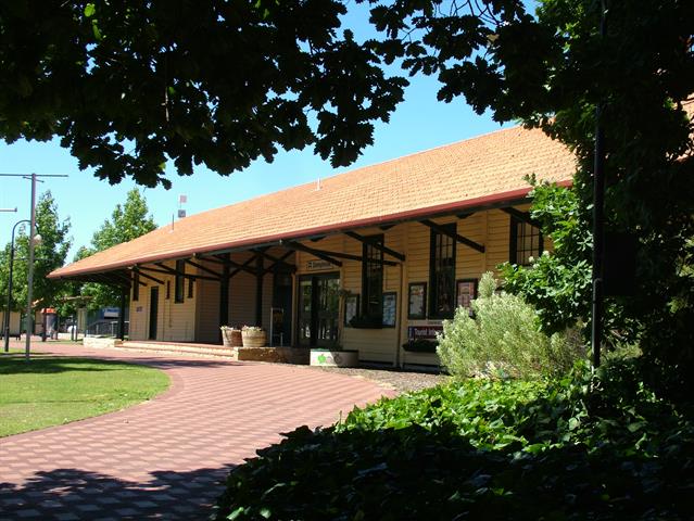 Station building from north oaktree ovehanging in foreground