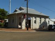 Painted stone building on prominent corner in Moora