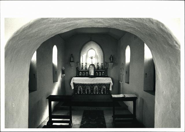 Interior view of chapel facing altar from entrance