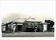 Angled front elevation of building