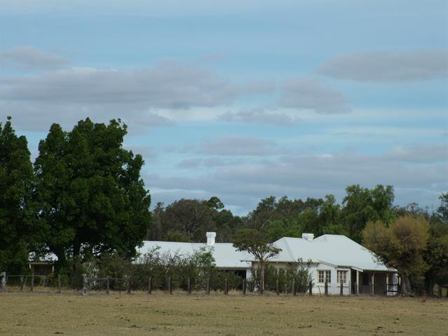 View from the railway reserve showing part of the NE and NW facades