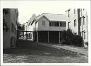 Rear elevation of main building (partly obscured)
