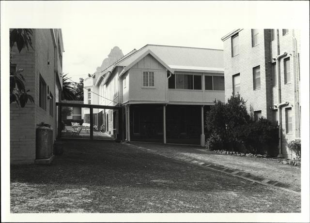 Rear elevation of main building (partly obscured)
