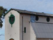 Eastern roof sheets missing and tarped