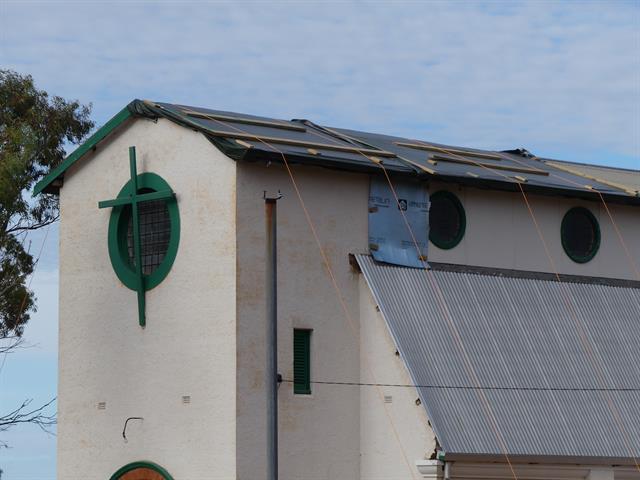Eastern roof sheets missing and tarped